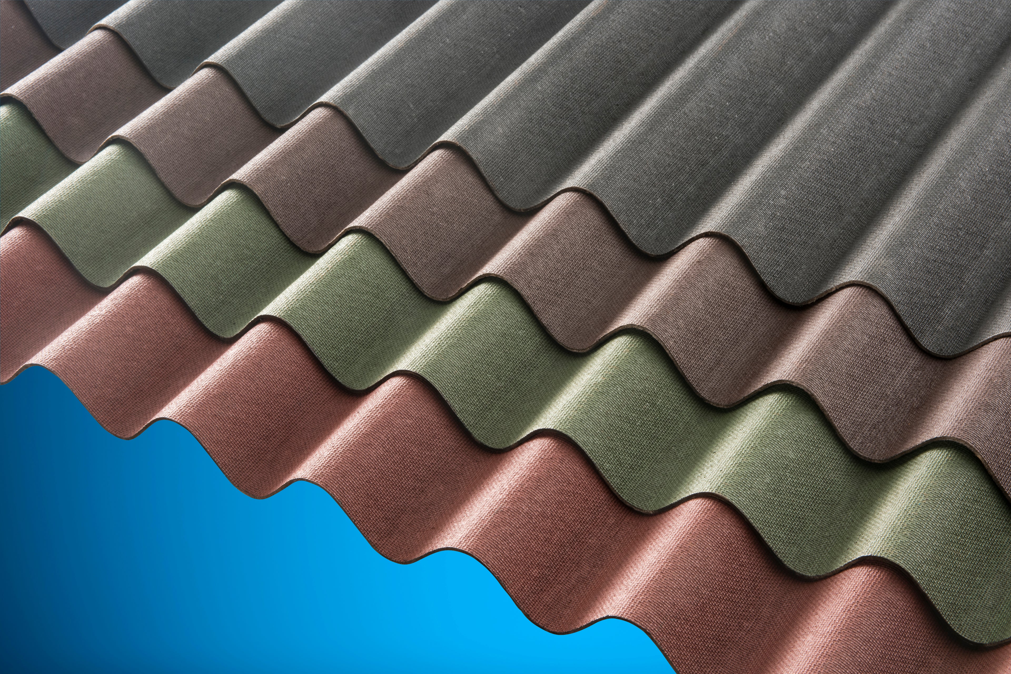 corrugated bitume roof sheets in black, brown, green and red